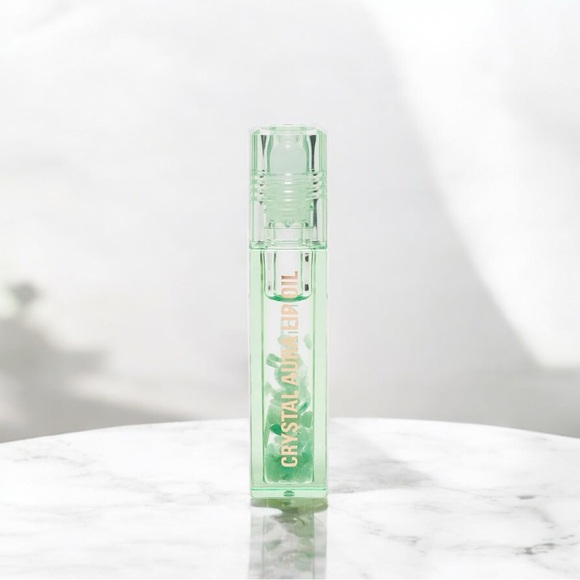 Revolution Crystal Aura Lip Oil in Aventurine-Retail $20 - Picture 1 of 5
